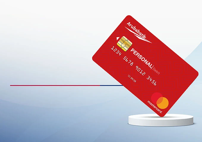 Aruba Bank ta cuminsa distribucion di su tarheta personal nobo di debito Mastercard