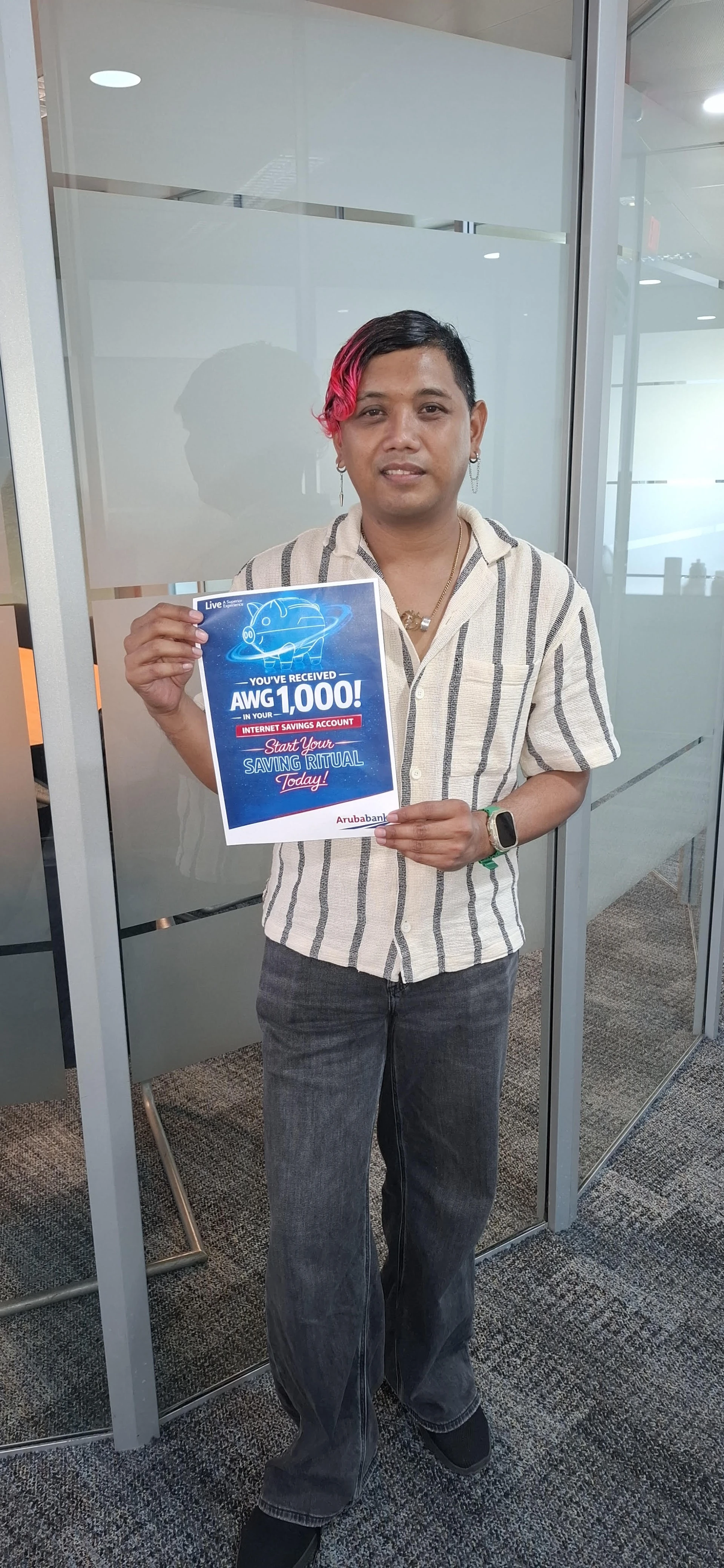 Arifin ta e ganador di AWG 1,000 di Aruba Bank su campaña di Spaar “The Saving Ritual”